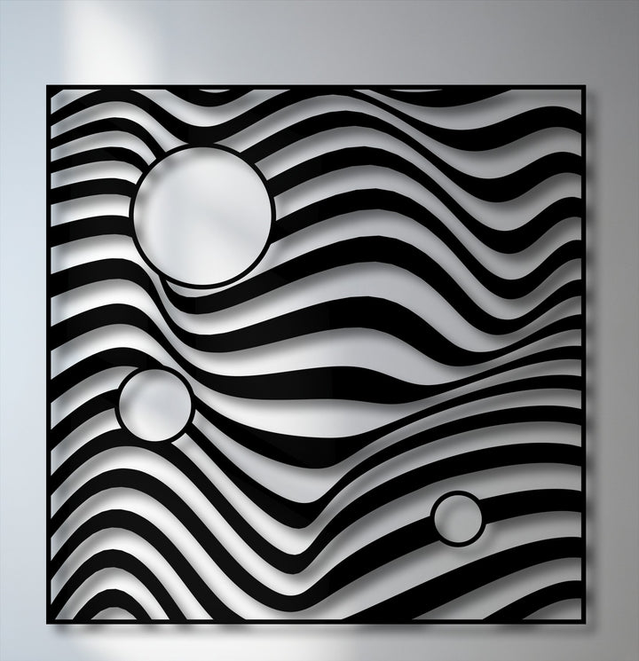 Negative space enhances the depth of black undulating stripes and circular voids in this abstract metal decoration wall art.