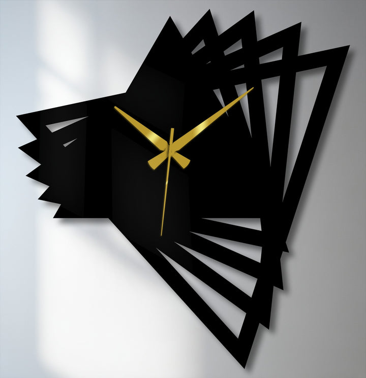 Subtle shadows define the softness of this abstract origami geometric modern metal wall clock, an eye-catching decorative metal art piece with striking gold hands.