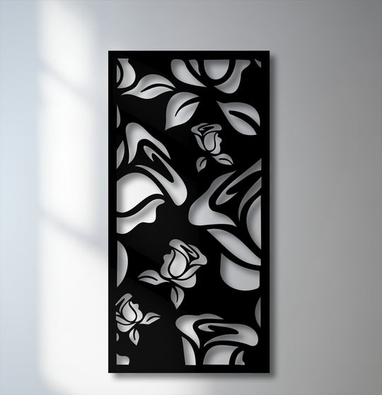 The brightest area, a sunlit white wall, illuminates the intricate rose pattern metal artwork with its gleaming silver cutouts.