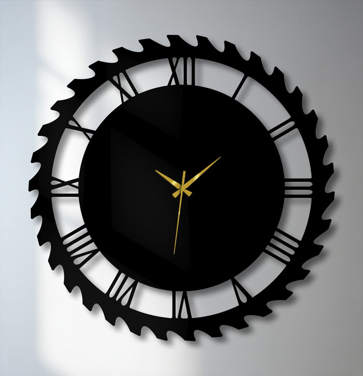The striking transition between the stark black industrial gear style decorative metal art clock and its subtle gray shadow on the wall emphasizes its Roman numeral design.