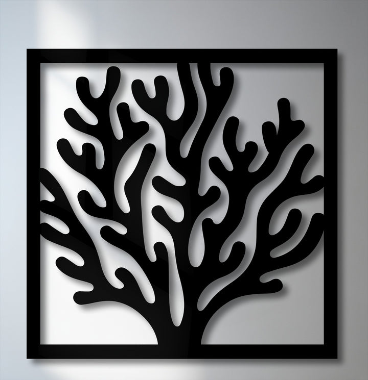The dynamic, flowing curves of the ocean-inspired coral in this unique metal wall art evoke a sense of graceful underwater movement.