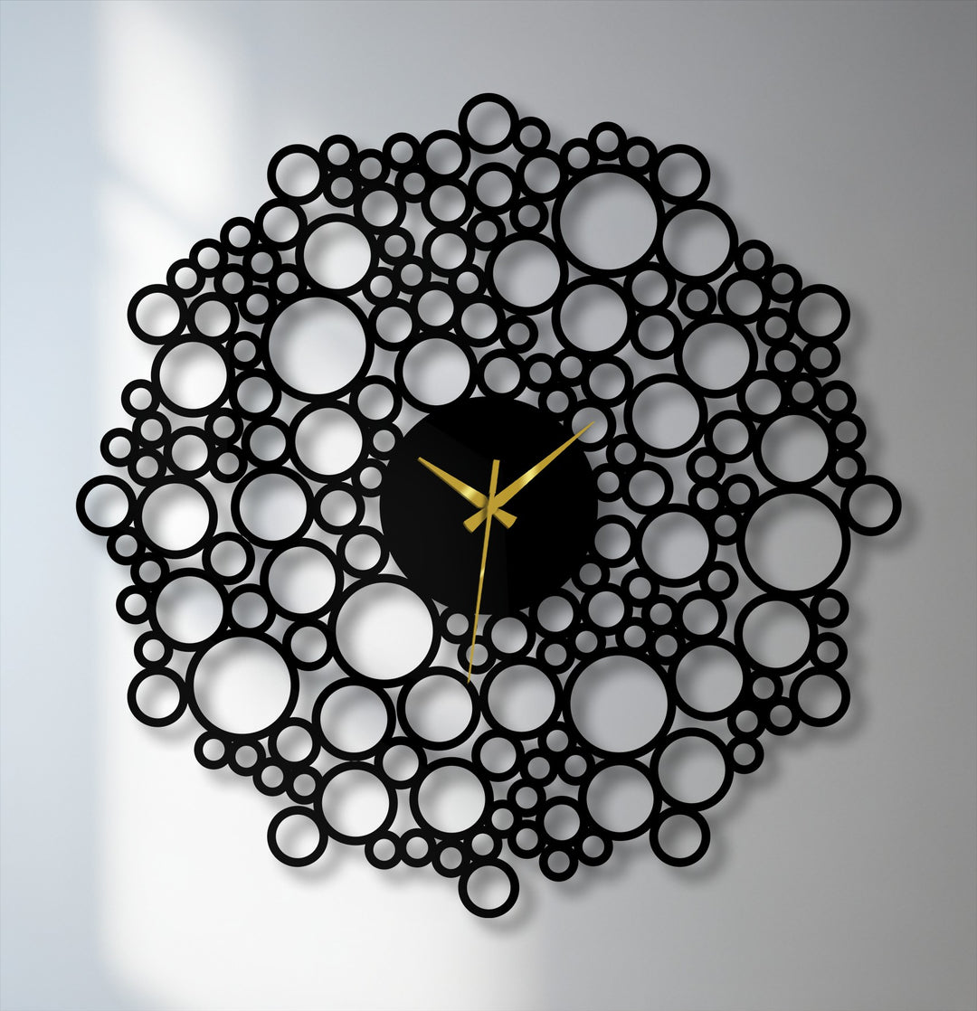 Depth and layers are accentuated in this unique metal wall art clock with a circular mesh of geometric metal, creating visual interest with its overlapping design.