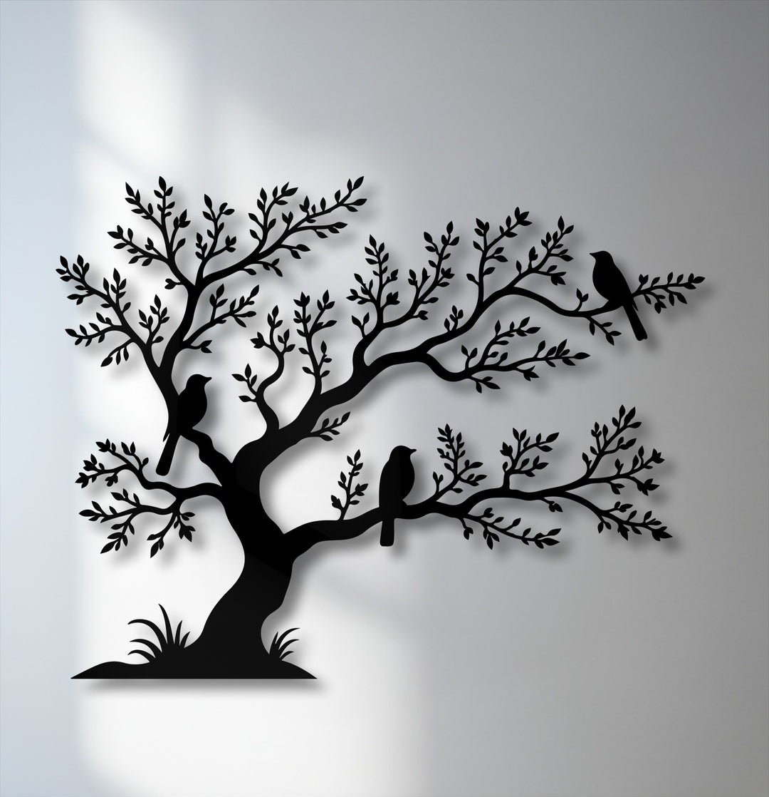 Displaying minimal color saturation, this Birds on Tree Metal Wall Art features a sharp black tree silhouette with birds, providing high-contrast metal wall decor.