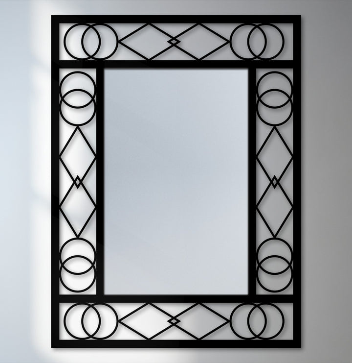 Reflecting a sense of movement, the circular and diamond pattern of this Art Deco decorative metal art mirror evokes dynamic, fluid design.