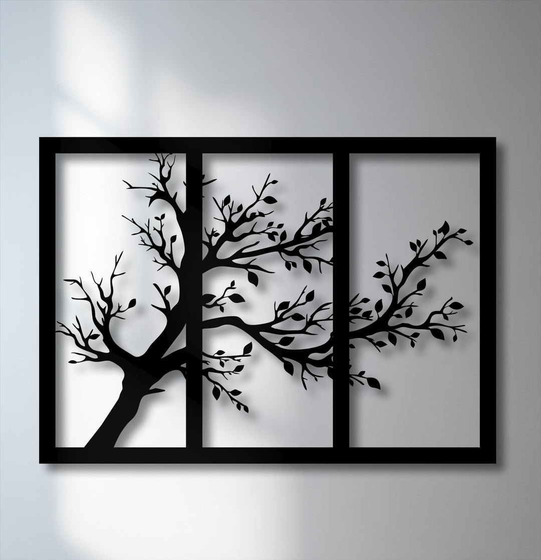 The stark black minimalist tree silhouette triptych creates a vivid color contrast against the bright background in this unique metal wall art.