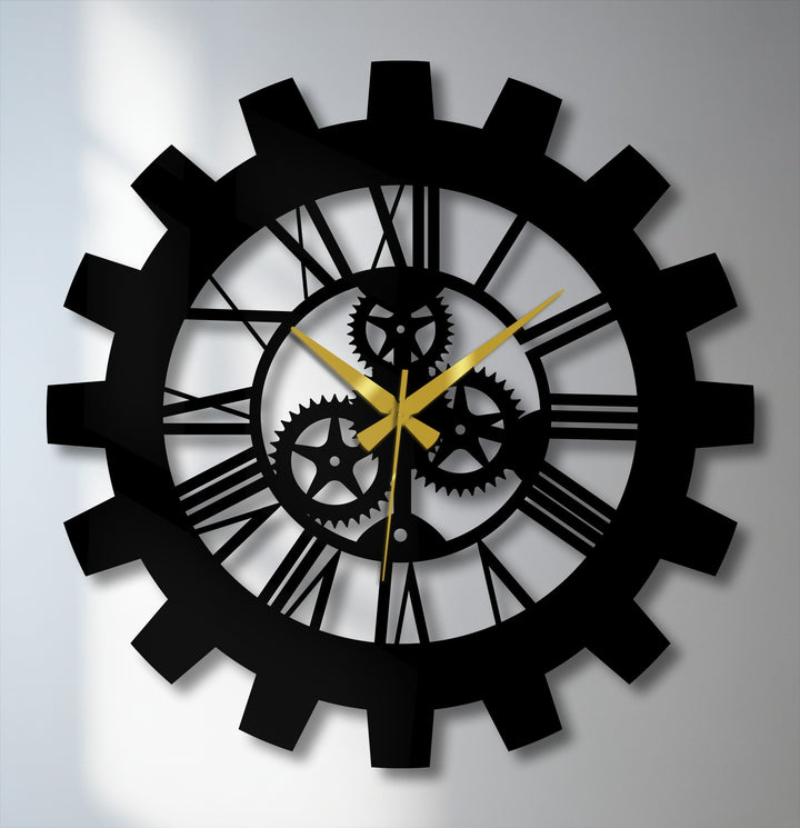 Cool color temperature highlights the bold contrast of this industrial gear metal artwork wall clock with its black steel and gleaming golden hands.