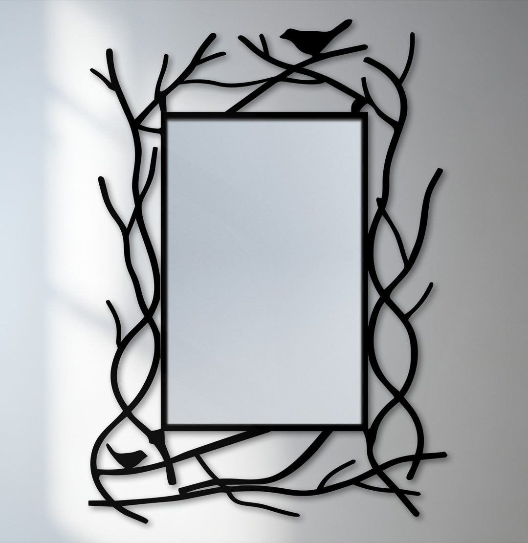Showcasing the realistic detail of the black metal wall decor of this nature-inspired floor mirror, framed with a branch design and subtle bird accents.