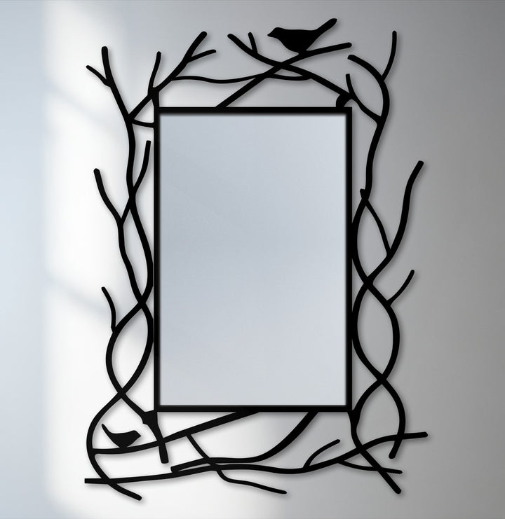 Showcasing the realistic detail of the black metal wall decor of this nature-inspired floor mirror, framed with a branch design and subtle bird accents.