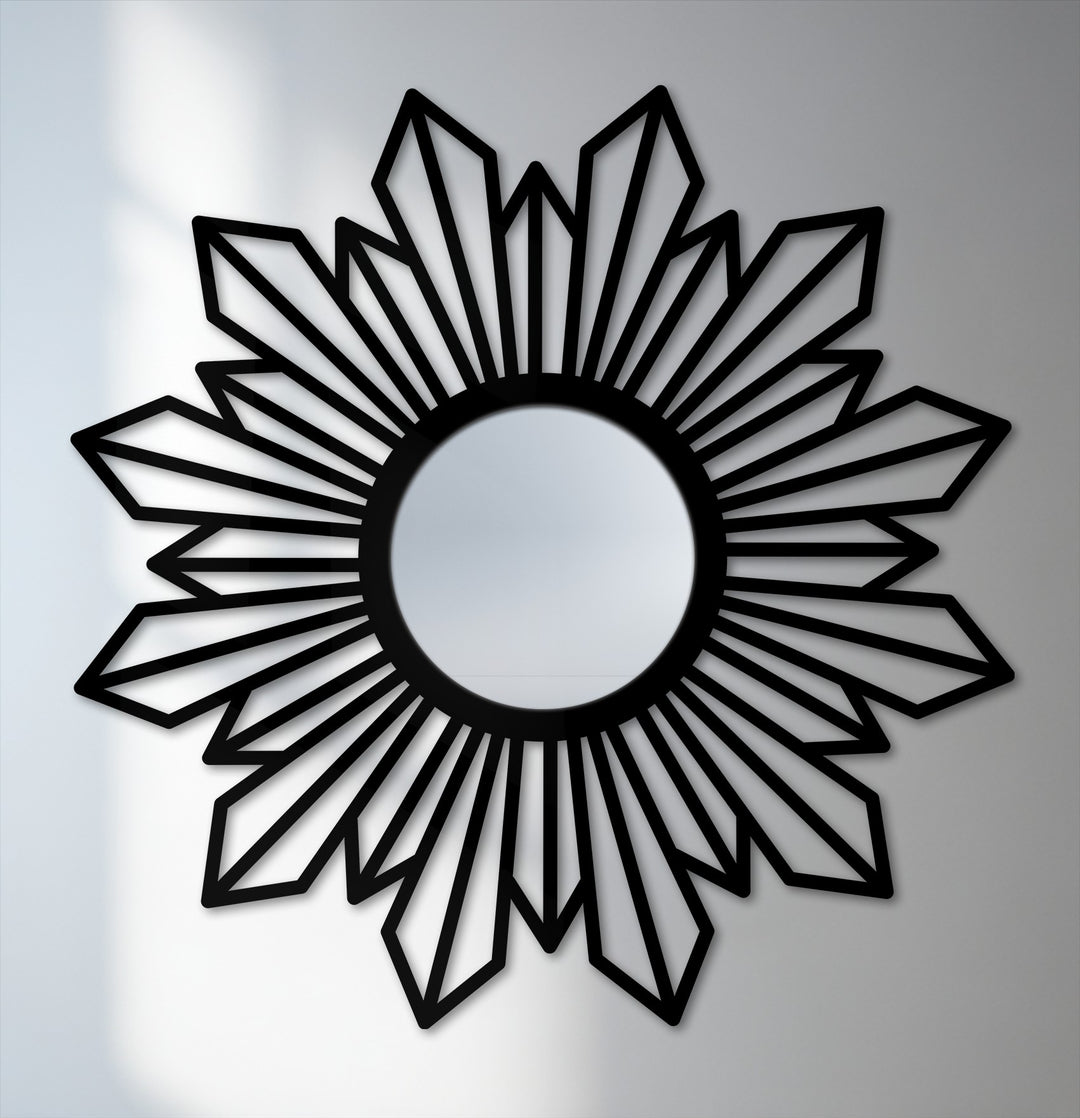 Illuminating any room, the sunburst design showcases the unique metal wall art radiating from a central mirror, creating a stunning layering effect.