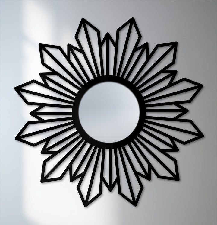 Illuminating any room, the sunburst design showcases the unique metal wall art radiating from a central mirror, creating a stunning layering effect.