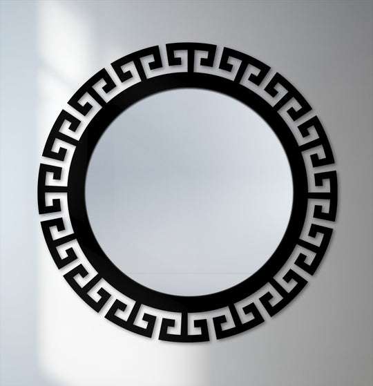 The round Greek key decorative wall mirror serves as a striking central subject in this reflective mirror for wall decor.
