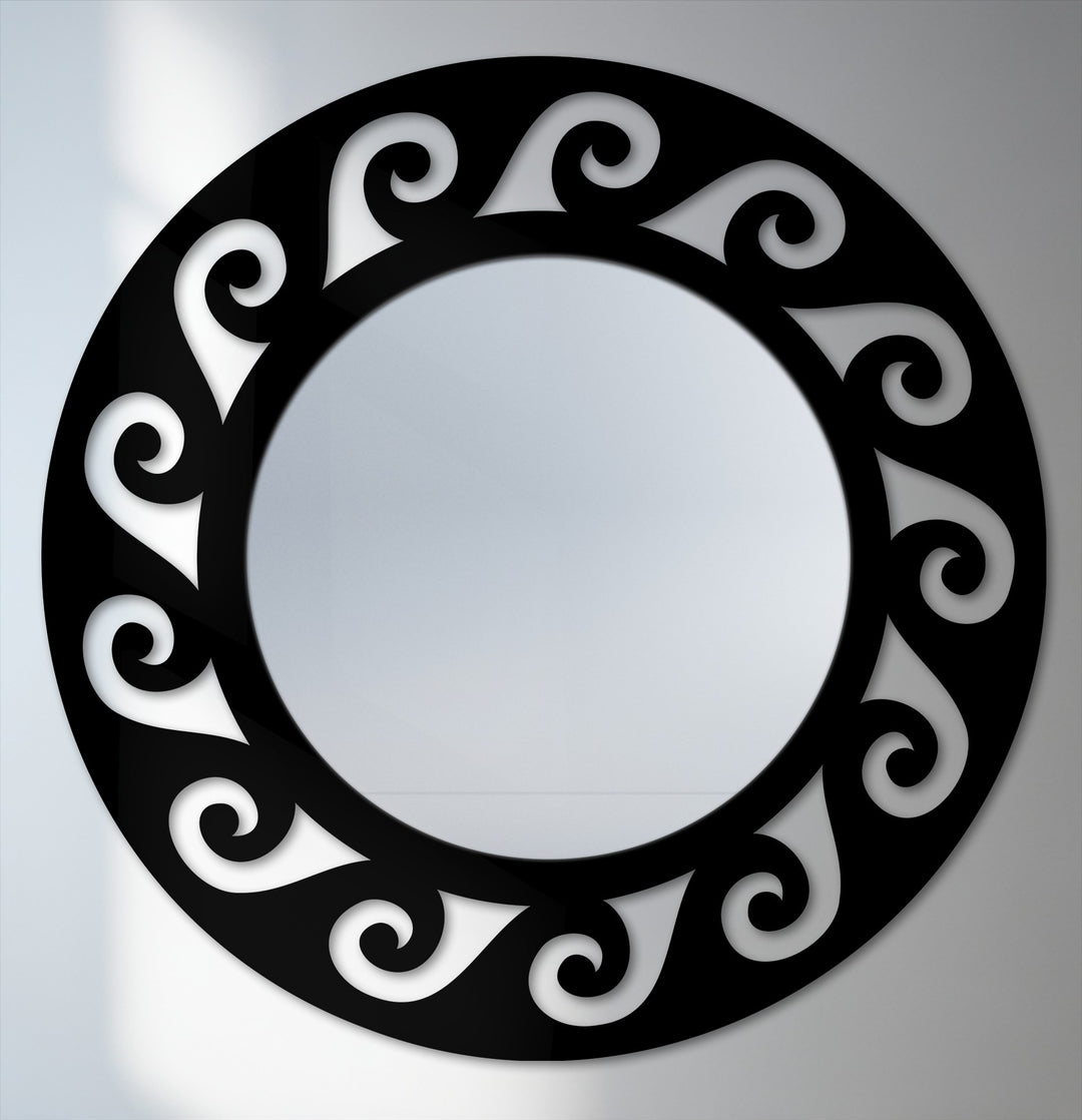Light and shadow play across the ornate scroll detailing of this modern wall mirrors, highlighting its elegant black metal frame and the round floor mirror.