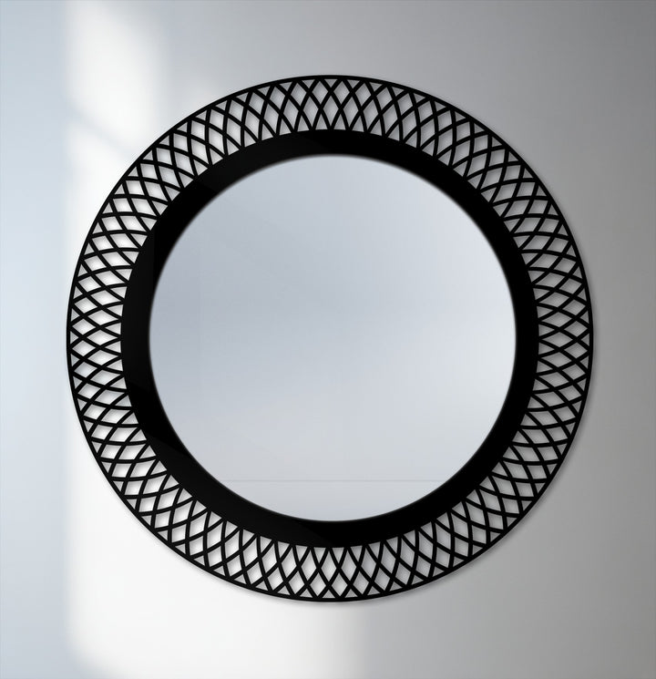 Layered depth is created in this geometric lattice round framed wall mirror with its ornate black metal frame adding dimension and visual interest.