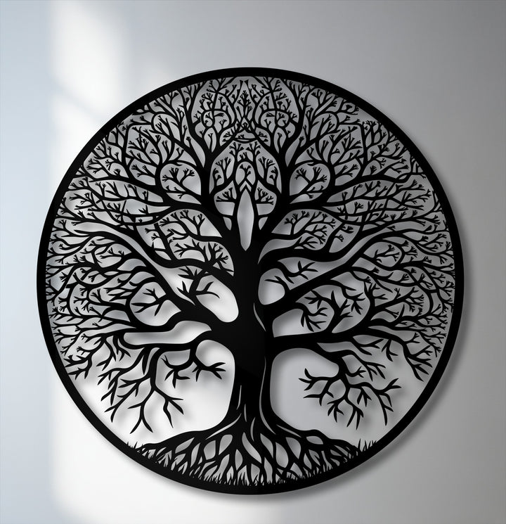Striking color contrast in the black Tree of Life metal artwork, sharply defined against a bright white and gray background with subtle shadows.