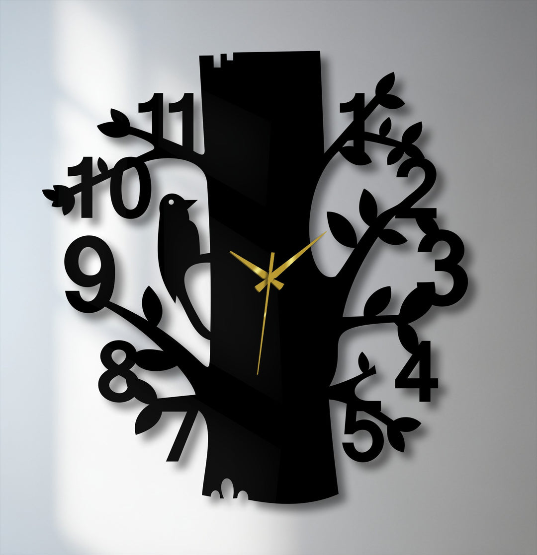 Highlighting the abstract quality, the forest bird metal wall clock utilizes decorative metal art to render a whimsical nature-tree design.