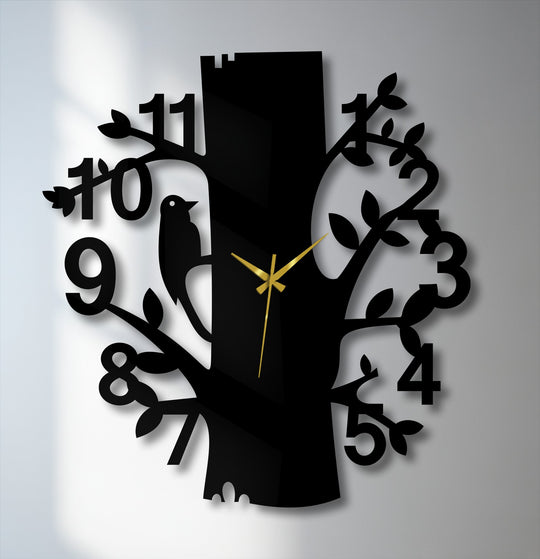 Highlighting the abstract quality, the forest bird metal wall clock utilizes decorative metal art to render a whimsical nature-tree design.
