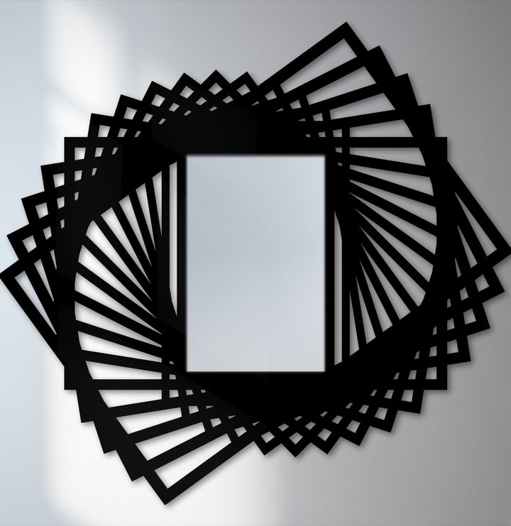 The bold black finish of this spiral fan metal floor mirror emphasizes its unique metal wall art design with a rotating geometric frame.