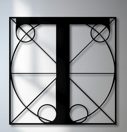 Geometric elements of intersecting lines, circles, and elegant curves define this sleek black Letter T metal art for wall with a modern monogram.