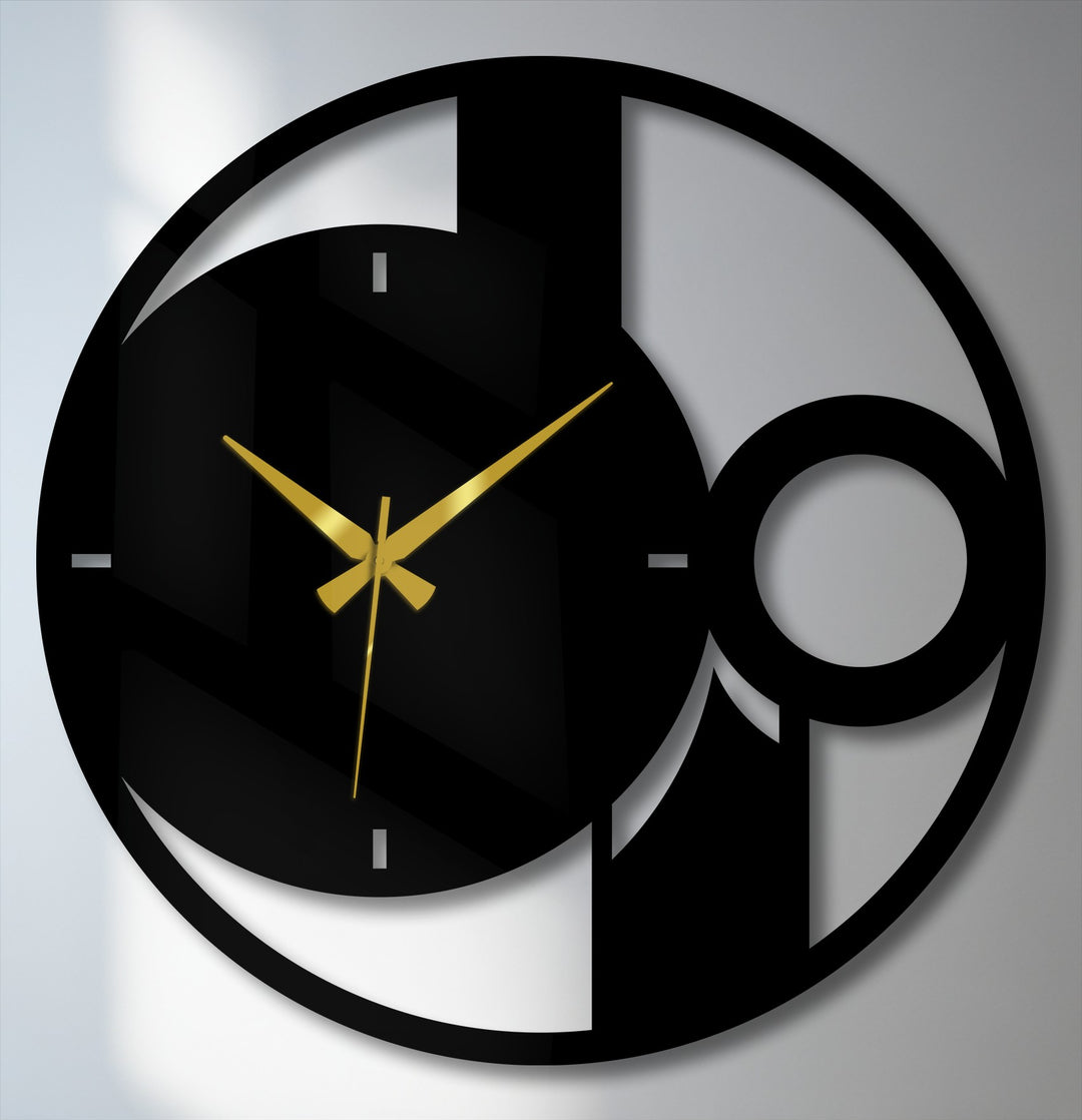 Softly lit, the background highlights the modern decoration wall art of this abstract minimal circle metal clock.