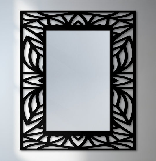 Visual rhythm is achieved in this tropical leaf silhouette frame on this modern wall mirrors design with the patterned black metal.