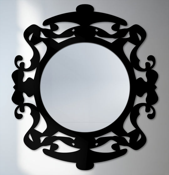 Black ornate round mirror with a metal frame offers a striking piece of metal wall decor, creating a bold statement for any home space.