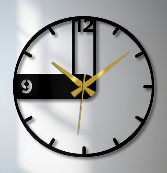 Bold gold hands emphasize the time on this modern asymmetrical black metal artwork clock, a contemporary decorative piece perfect for minimalist spaces.