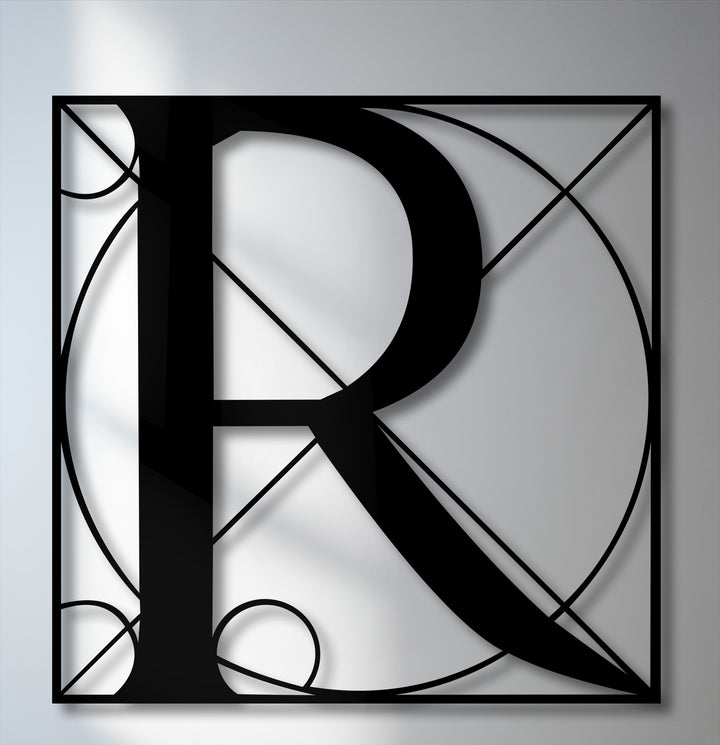 Striking geometric lines and circles intricately form a stylized letter R, presenting captivating metal wall decor with depth.