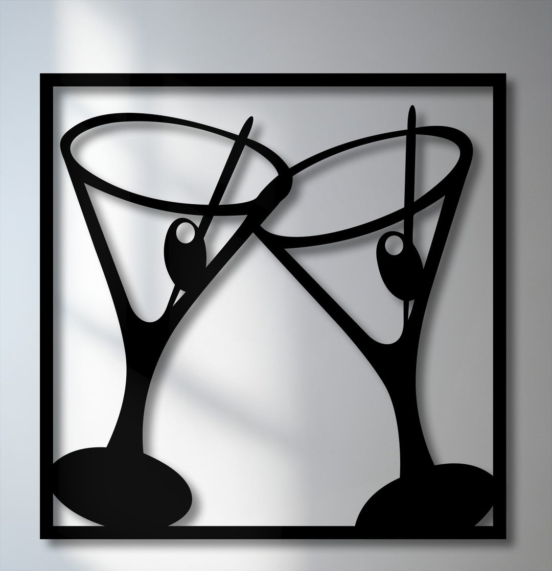 A bold black silhouette of two stylish clinking martini glasses with olives framed in black, perfect modern bar decoration wall art.