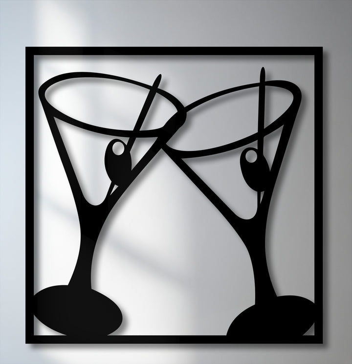A bold black silhouette of two stylish clinking martini glasses with olives framed in black, perfect modern bar decoration wall art.