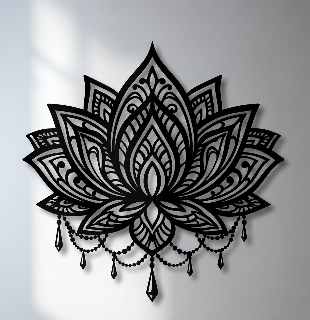Visual rhythm defines ornate lotus mandala metal artwork, showcasing symmetrical, flowing patterns and delicate beaded chains for harmonious movement.