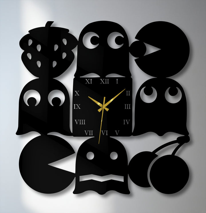 The smooth, matte texture of this decorative metal art wall clock highlights its sleek, retro arcade character designs.