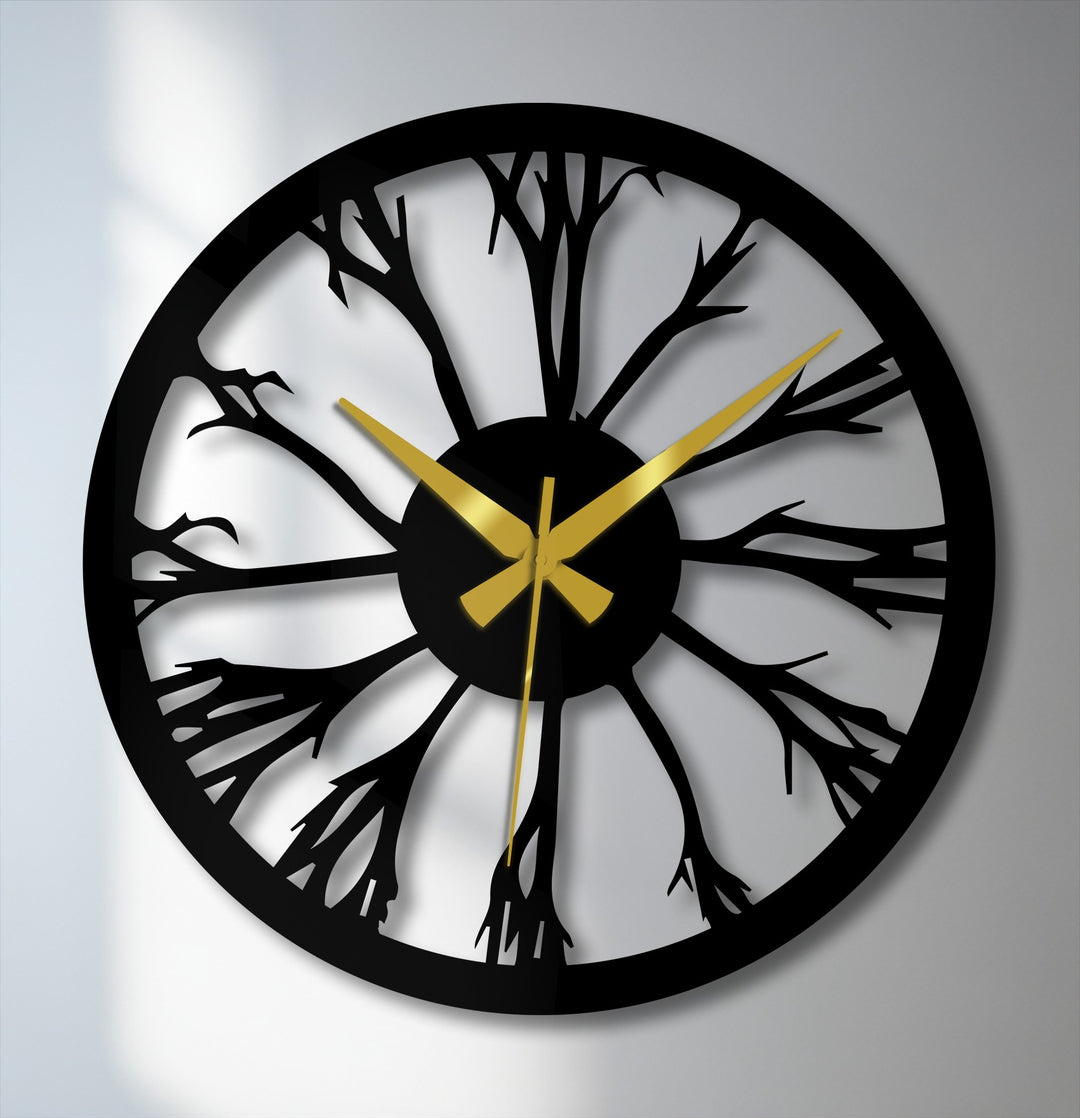 Foreground detail reveals a tree silhouette within this unique metal wall clock, a striking example of decoration wall art inspired by nature.