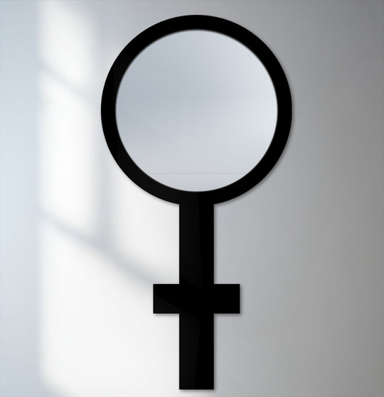 The stillness of the symbolic floor mirror reflects a modern elegance, its black frame highlighting its unique design as a sophisticated mirror for wall decor.