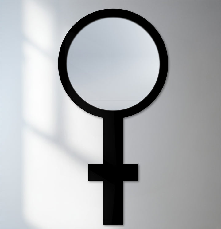 The stillness of the symbolic floor mirror reflects a modern elegance, its black frame highlighting its unique design as a sophisticated mirror for wall decor.