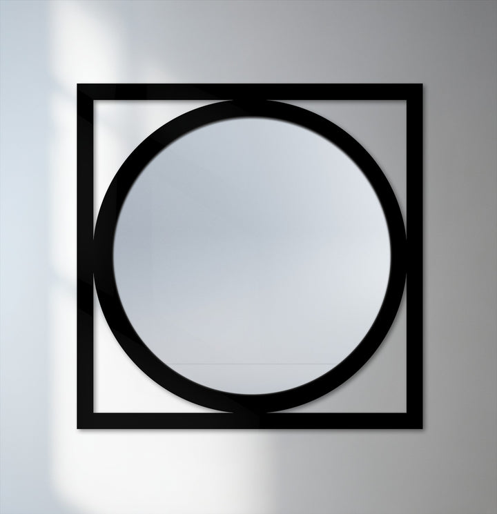 Reflecting minimalism, this round bathroom mirror features a sleek, black square metal frame creating a visually striking metal artwork focal point.