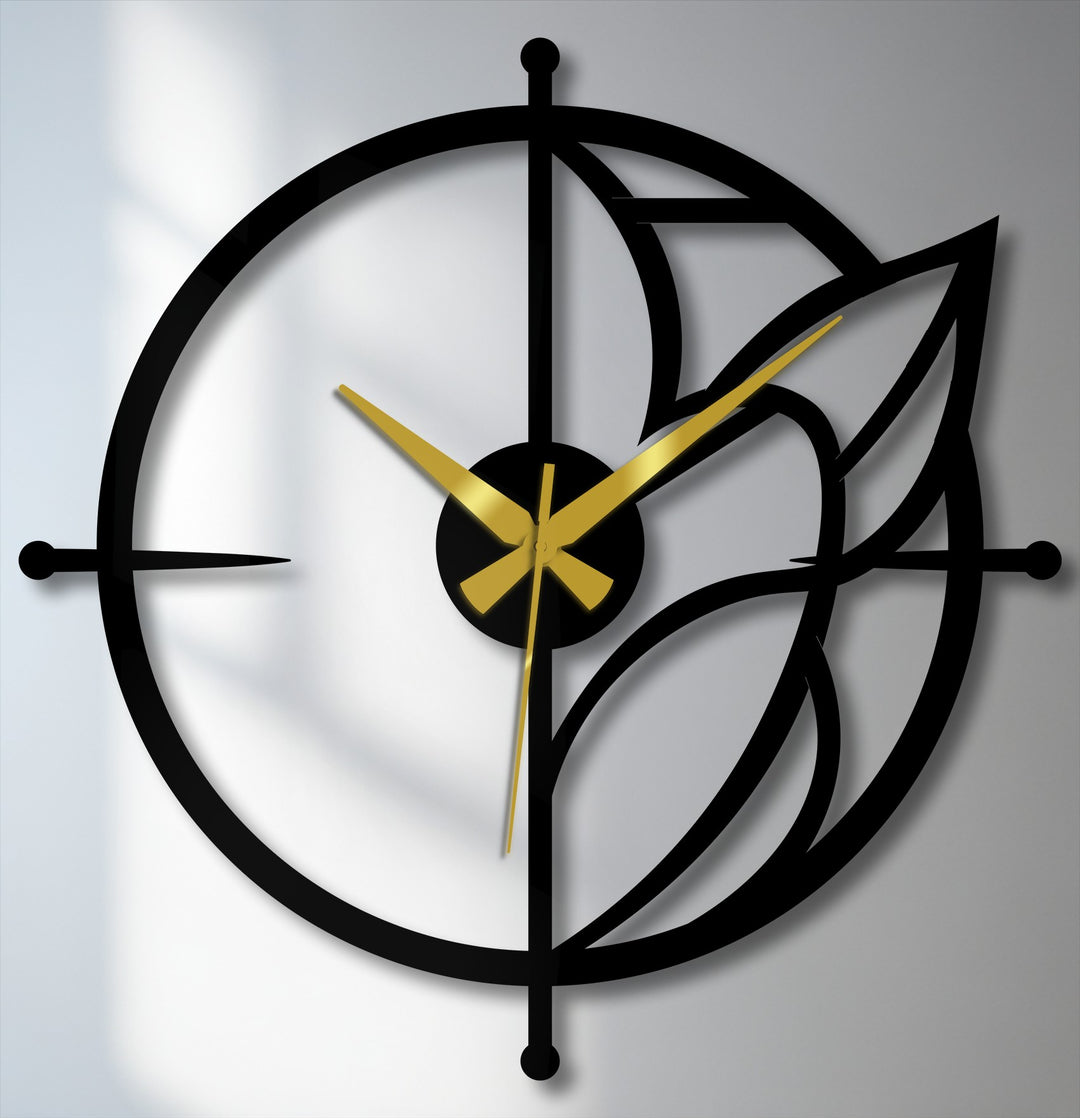 Swirling lines and leaf accents of this metal wall clock give a sense of constant motion, bringing a striking dynamism to this unique metal wall art piece.