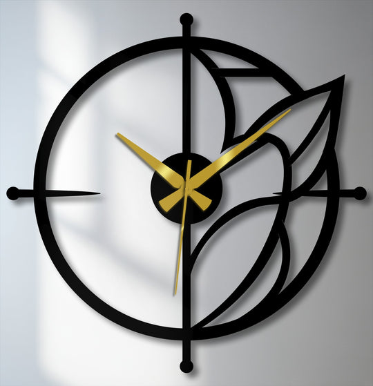 Swirling lines and leaf accents of this metal wall clock give a sense of constant motion, bringing a striking dynamism to this unique metal wall art piece.