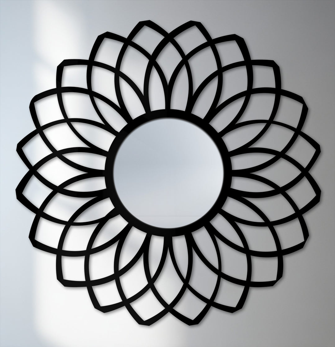The saturated black on the layered petal design of this framed wall mirror creates a bold contrast, enhancing its unique and decorative appeal.