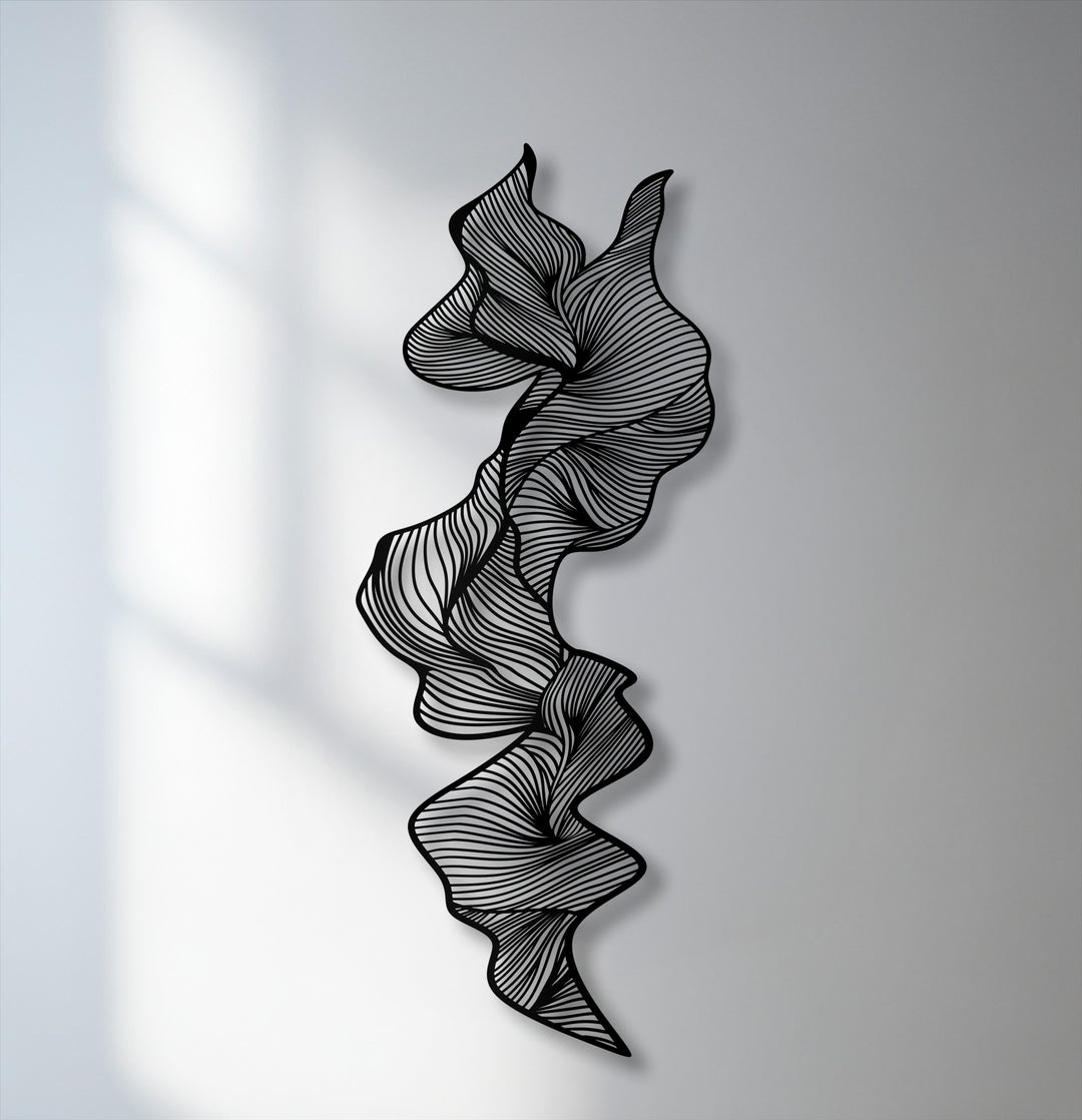 A seamless transition from bright, shadow-dappled white to soft grey wall colors accentuates the intricate, swirling lines of the metal artwork.
