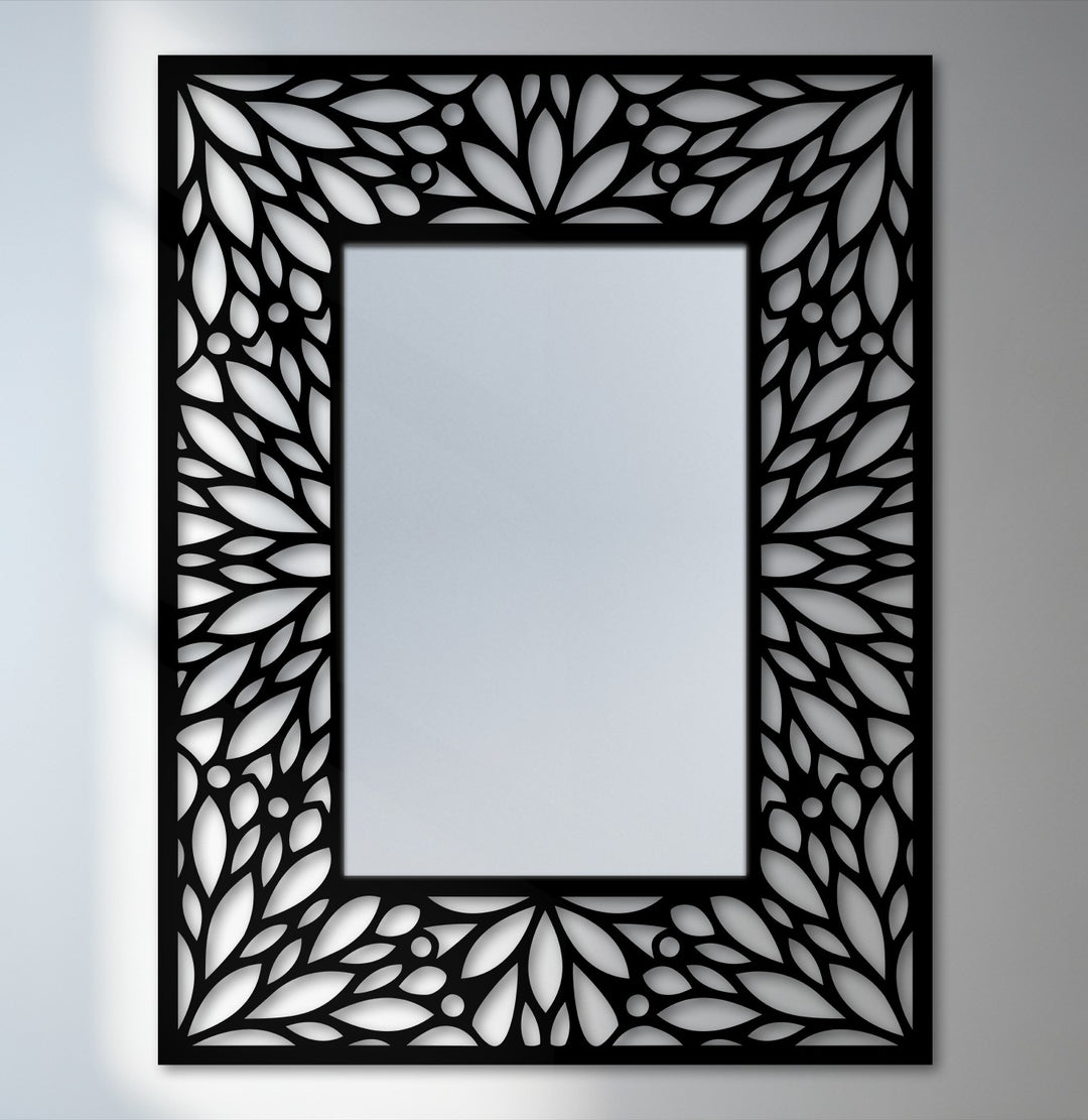 A subtle, light-grey background complements the intricate floral metal wall decor of this striking frame design, enhancing the modern wall mirrors aesthetic.