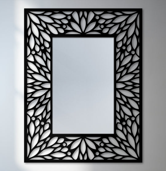 A subtle, light-grey background complements the intricate floral metal wall decor of this striking frame design, enhancing the modern wall mirrors aesthetic.