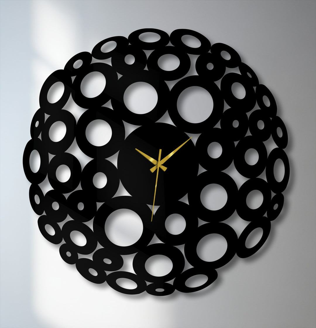 The realistic detail of this bubble circle metal wall clock is highlighted by its intricate, ring design, making it a stunning example of metal art for wall decor.