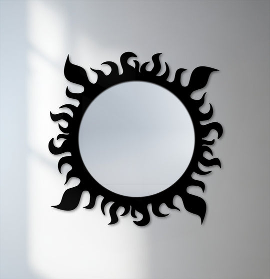 Observed as the darkest area, the flame-inspired, asymmetrical frame accentuates this solar flame round decorative bathroom mirror's modern design.