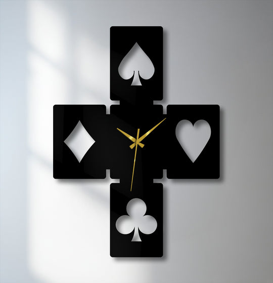 The distinct, rounded edges and smooth borders of each black playing card symbol create this unique decorative metal art wall clock.