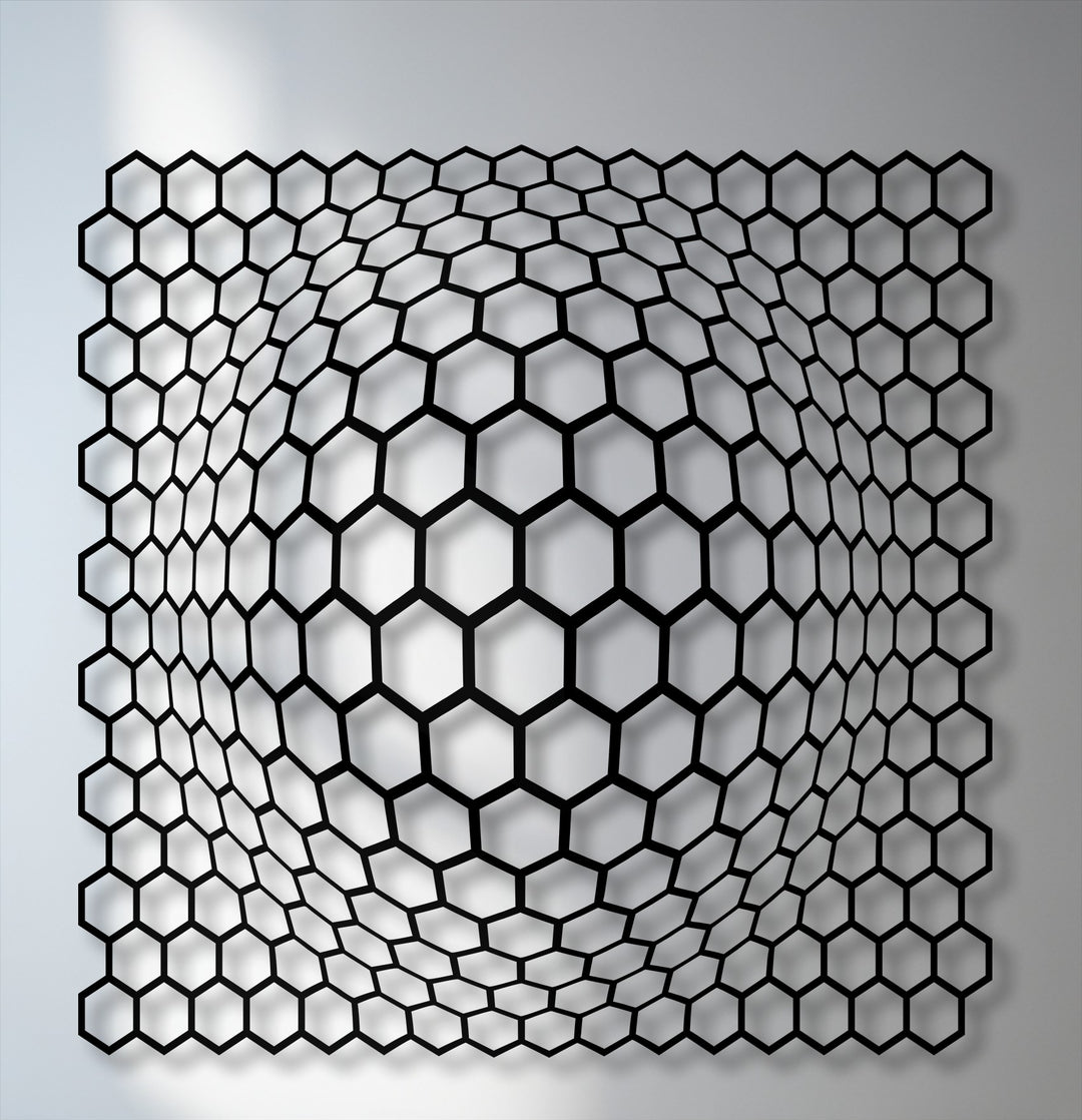The negative space creates a striking 3D optical illusion of a curving hexagon grid, showcasing modern metal artwork.