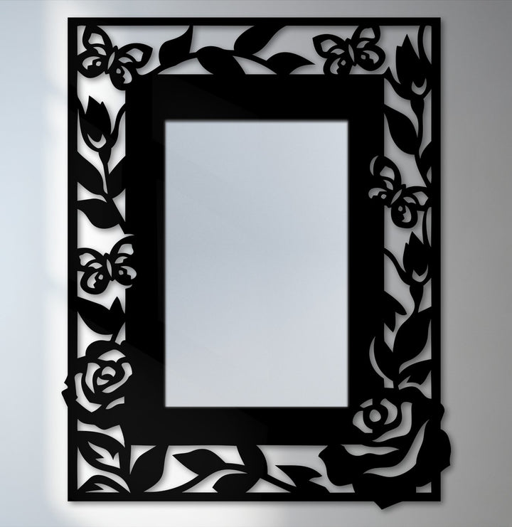 Floral butterfly frame stands out as decorative metal art, reflecting an elegant nature-inspired design, showcasing the detailed craftsmanship of the wall mirror.