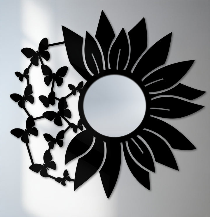 Vertically oriented round decorative mirror features a unique black metal frame in a sunflower shape with butterfly accents.