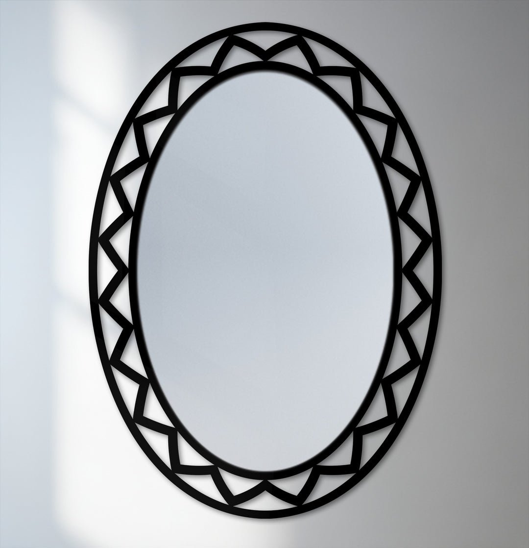 With cool color temperatures highlighting its sleek black frame, this geometric oval floor mirror serves as a modern, striking piece of metal wall decor.