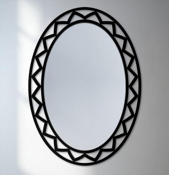 With cool color temperatures highlighting its sleek black frame, this geometric oval floor mirror serves as a modern, striking piece of metal wall decor.