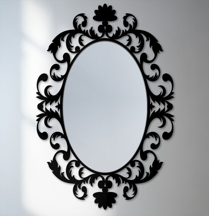 Visual rhythm emanates from this framed wall mirror, as the baroque scrollwork flows in an oval pattern around the looking glass surface.